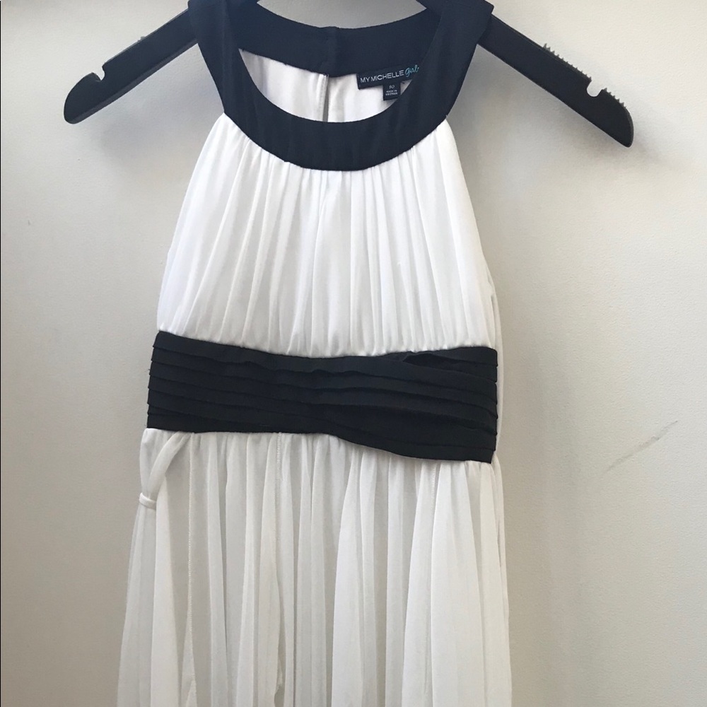White halter neck dress with black accents